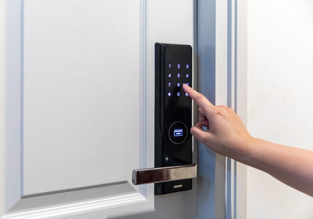 A digital door lock on a modern door.